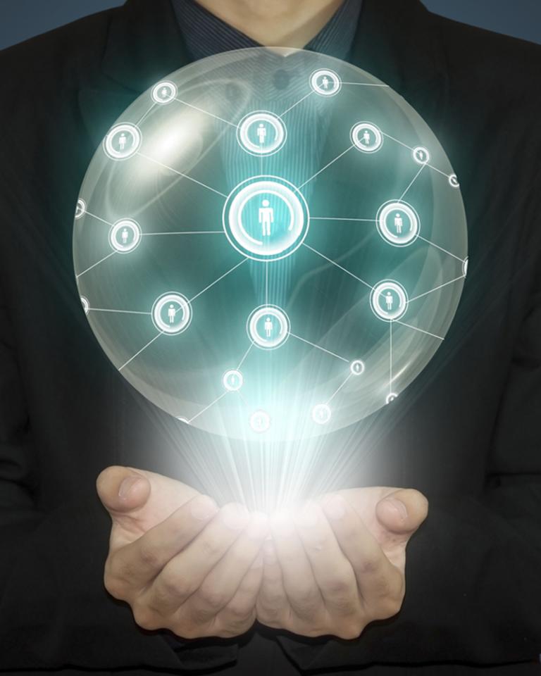 Hands holding a globe